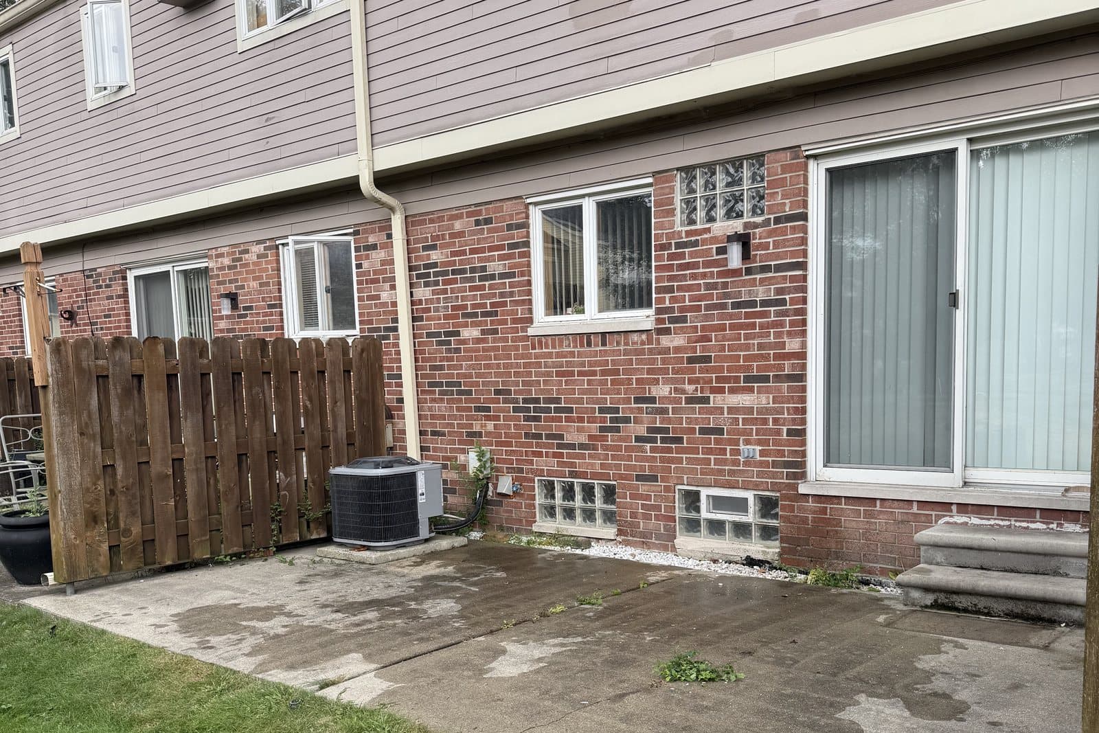 A cleared and swept patio at the end of a Redemption cleanout.